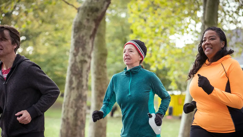 Group of older people jogging outdoors