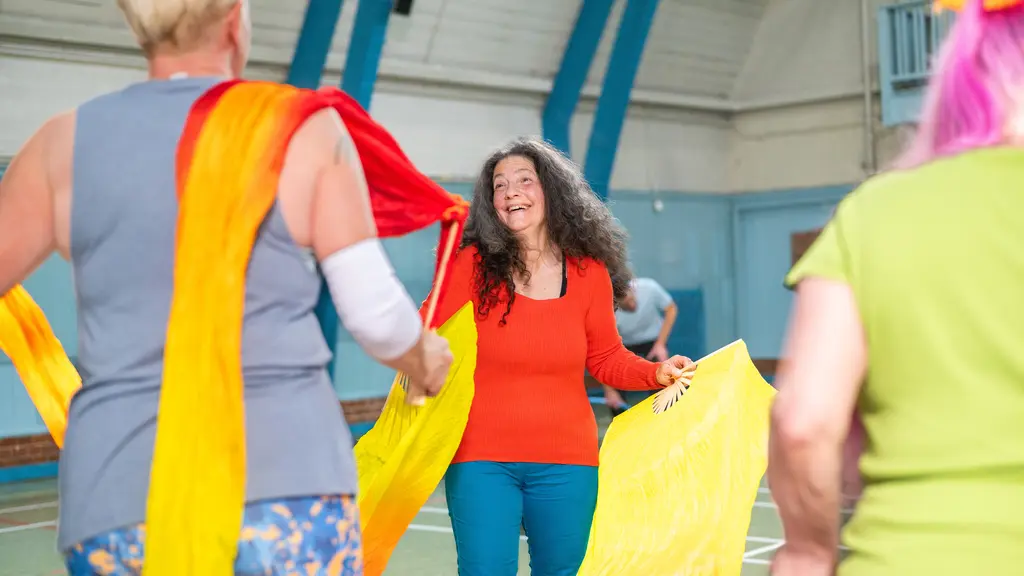 A group of older women rehearse for a circus show