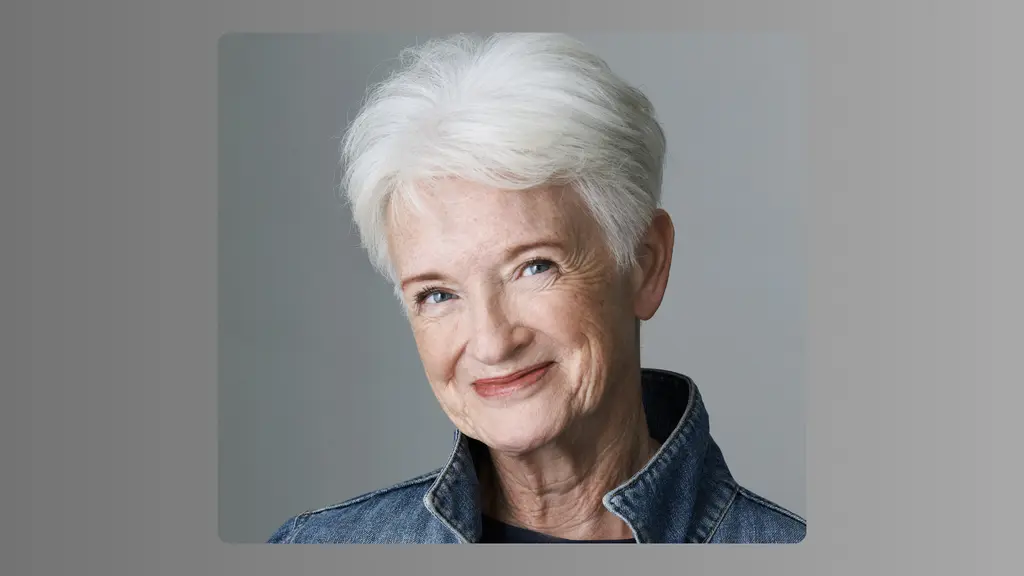 Photo of Annie in Demin jacket grey background
