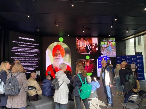 Crowds enjoy the Challenging Ageism exhibition