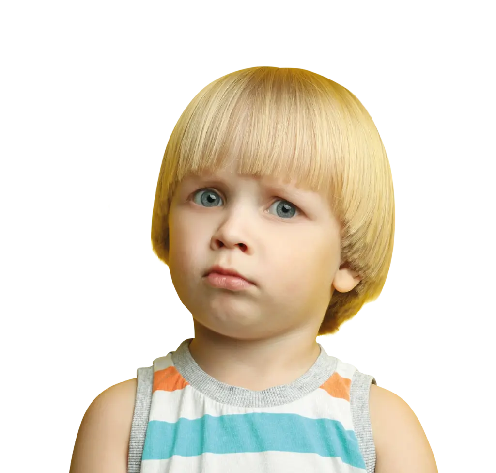 Young blonde boy with a confused look on his face